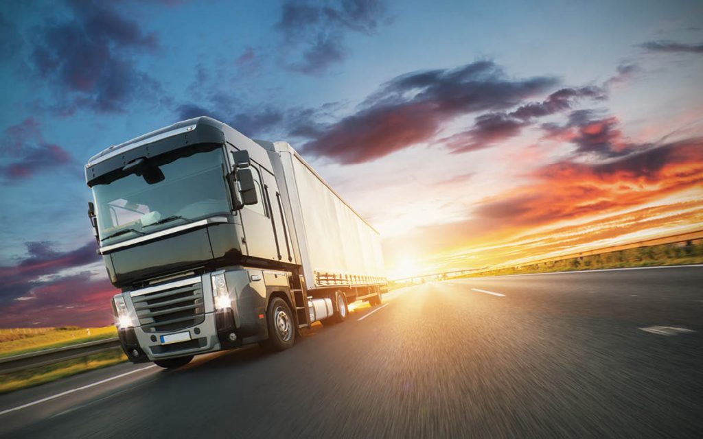 Truck Travelling in Sunset Image